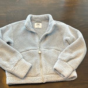 Toasty Athleta Girl fleece with zipper front.
